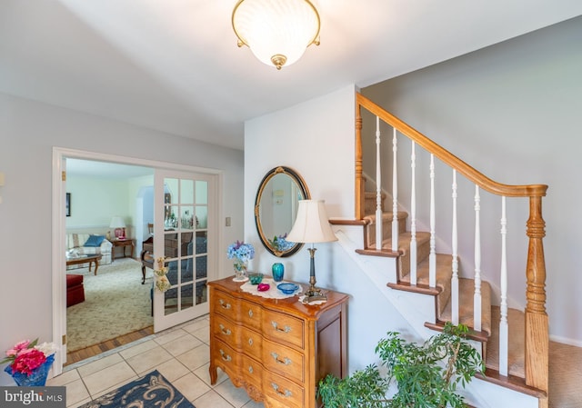 interior space with tile patterned floors and french doors