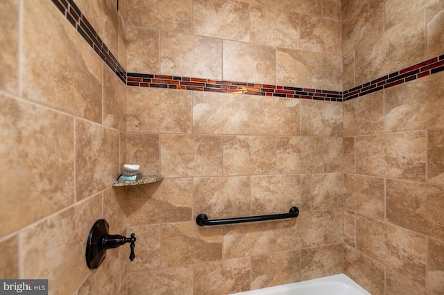 room details with a bathtub and a shower