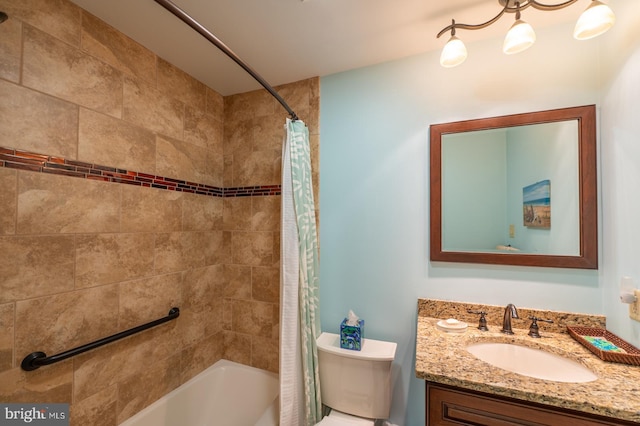 bathroom with vanity, shower / tub combo with curtain, and toilet