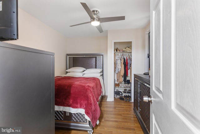 bedroom with wood finished floors and ceiling fan