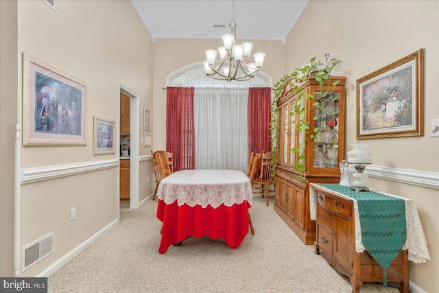 93 Radcliff Ln, Falling Waters, WV 25419 - dining area with crown molding, visible vents, baseboards, an inviting chandelier, and light carpet