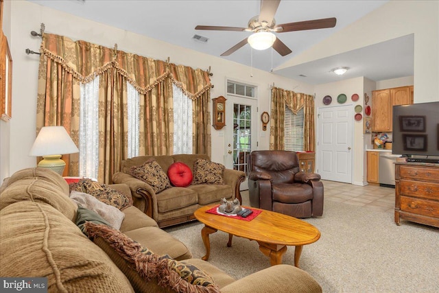 93 Radcliff Ln, Falling Waters, WV 25419 - living area featuring lofted ceiling, light tile patterned floors, visible vents, and a ceiling fan