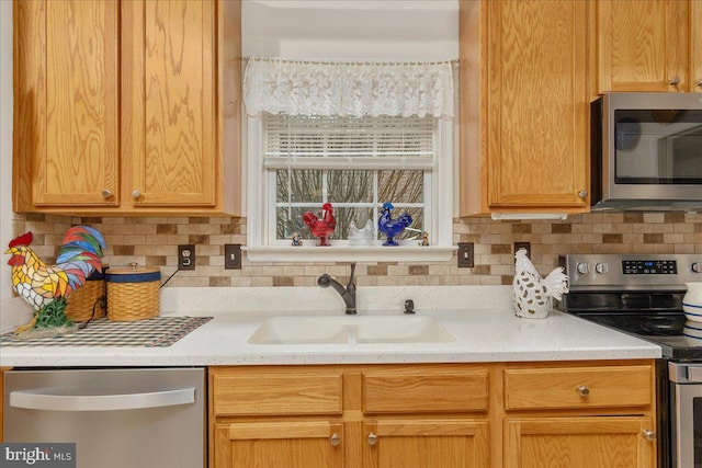 93 Radcliff Ln, Falling Waters, WV 25419 - kitchen with appliances with stainless steel finishes, light countertops, backsplash, and a sink