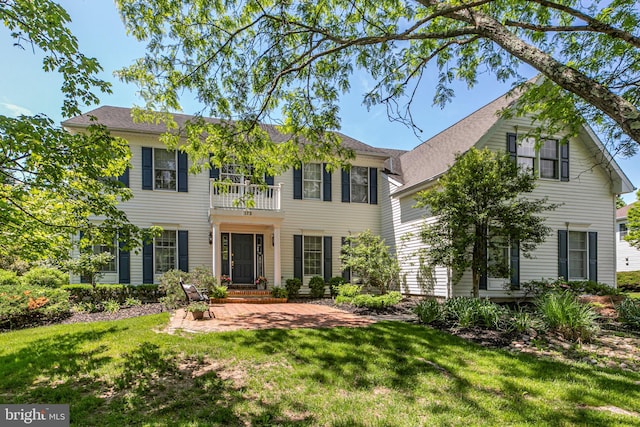173 Christopher Dr, Princeton, NJ 08540 - view of front facade with a balcony, a front yard, and a patio