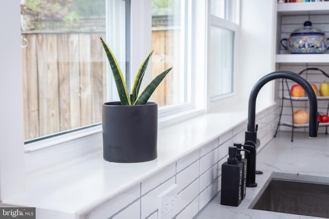 details with light countertops and a sink