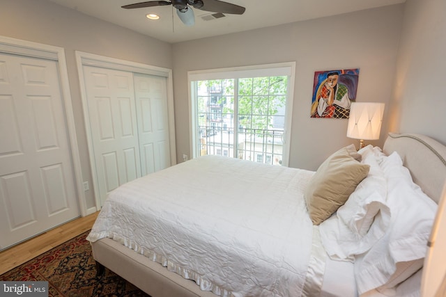 bedroom with recessed lighting, a ceiling fan, visible vents, and wood finished floors