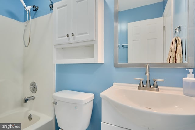full bathroom featuring shower / bathtub combination, toilet, and vanity