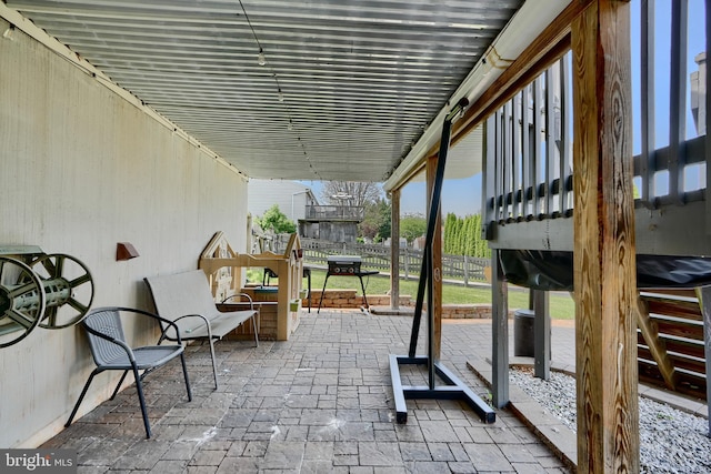 view of patio with fence