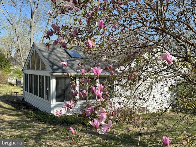 403 Leslie Ln, West Chester, PA 19382 - view of property exterior featuring a sunroom and roof with shingles