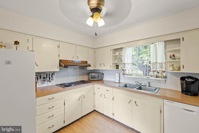2385 Heide Cooper Rd, Shanks, WV 26761 - kitchen featuring tasteful backsplash, open shelves, a sink, under cabinet range hood, and white appliances