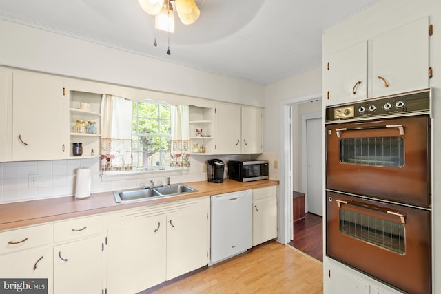 2385 Heide Cooper Rd, Shanks, WV 26761 - kitchen with open shelves, multiple ovens, stainless steel microwave, a sink, and dishwasher