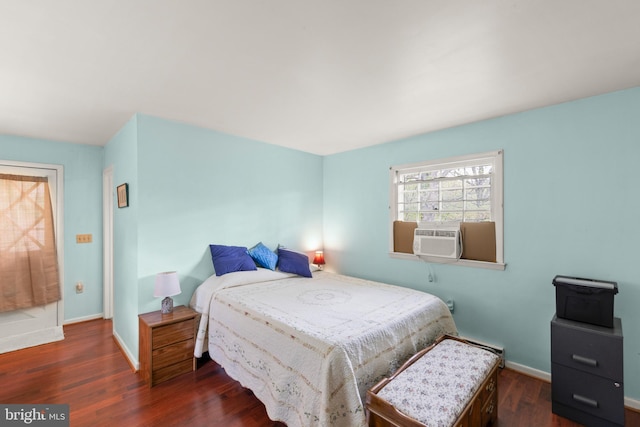 2385 Heide Cooper Rd, Shanks, WV 26761 - bedroom featuring baseboards, cooling unit, a baseboard heating unit, and wood finished floors