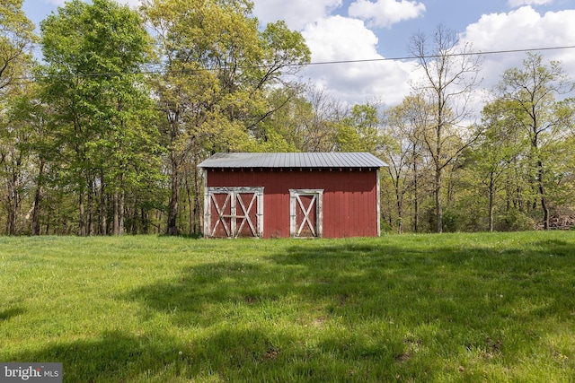 2385 Heide Cooper Rd, Shanks, WV 26761 - view of barn with a yard