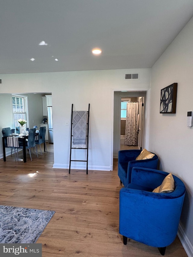 3724 Cedar Dr, Baltimore, MD 21207 - living area featuring baseboards, wood finished floors, and recessed lighting