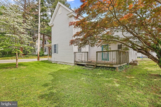 112 Walnut St, Church Hill, MD 21623 - back of property with a wooden deck and a yard