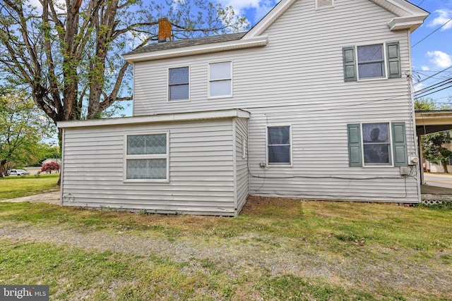 112 Walnut St, Church Hill, MD 21623 - back of house featuring a chimney and a yard