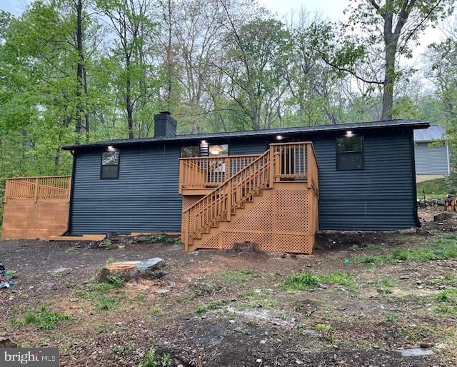 212 Graywolf Trl, Winchester, VA 22602 - exterior space featuring stairs, a chimney, and a deck