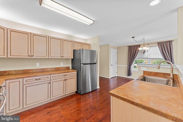 1100 Balley Dr Unit 4, Phoenixville, PA 19460 - kitchen featuring freestanding refrigerator, a sink, dark wood-type flooring, ornamental molding, and a chandelier