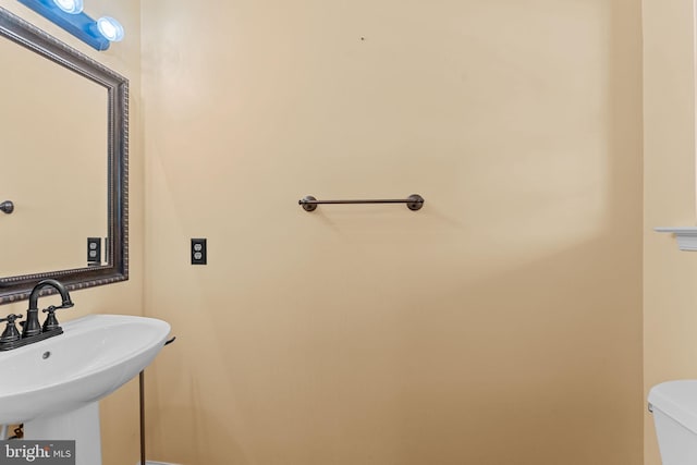 1100 Balley Dr Unit 4, Phoenixville, PA 19460 - half bath with a sink, toilet, and baseboards
