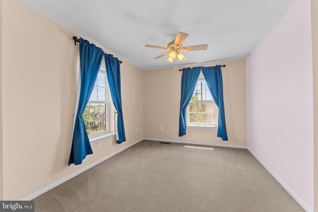 1100 Balley Dr Unit 4, Phoenixville, PA 19460 - empty room featuring carpet flooring, baseboards, and ceiling fan