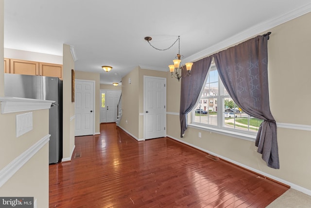 1100 Balley Dr Unit 4, Phoenixville, PA 19460 - unfurnished dining area with a chandelier, hardwood / wood-style floors, and baseboards