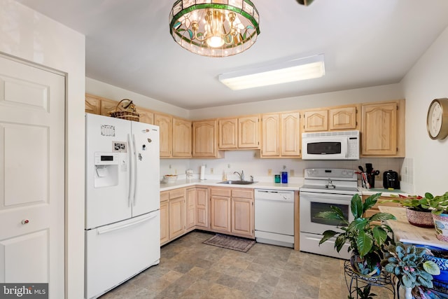 3907 Hannon Ct Unit 3B, Nottingham, MD 21236 - kitchen with white appliances, light brown cabinetry, a sink, light countertops, and stone finish flooring