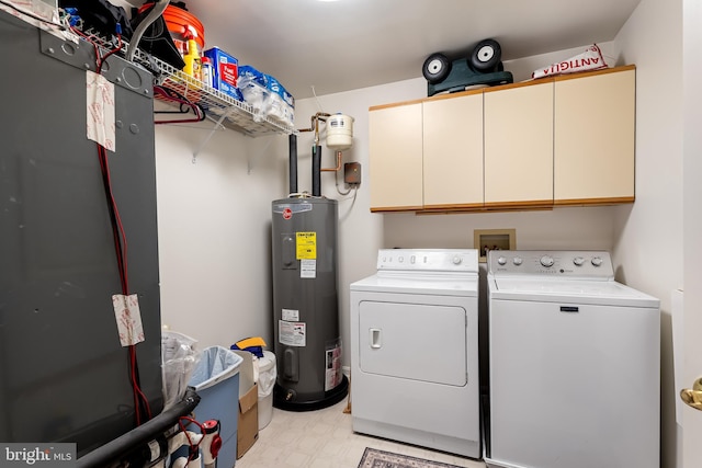 3907 Hannon Ct Unit 3B, Nottingham, MD 21236 - laundry room featuring electric water heater, cabinet space, independent washer and dryer, and light flooring