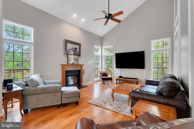 11294 Country Club Rd, New Market, MD 21774 - living area featuring high vaulted ceiling, a fireplace with flush hearth, light wood finished floors, ceiling fan, and recessed lighting