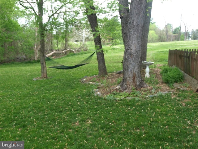 view of yard with fence