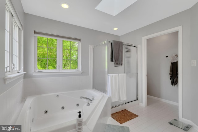 11294 Country Club Rd, New Market, MD 21774 - bathroom featuring a skylight, a jetted tub, a shower stall, and tile patterned floors