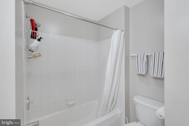 11294 Country Club Rd, New Market, MD 21774 - bathroom featuring shower / bathtub combination with curtain and toilet