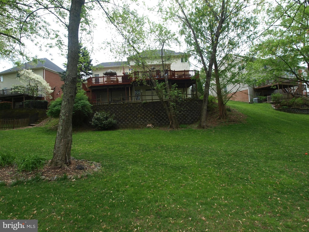 view of yard with a deck