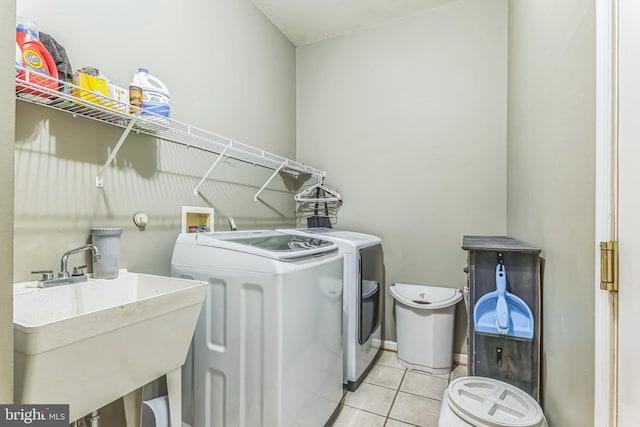 11294 Country Club Rd, New Market, MD 21774 - laundry room with washing machine and clothes dryer, tile patterned floors, and baseboards