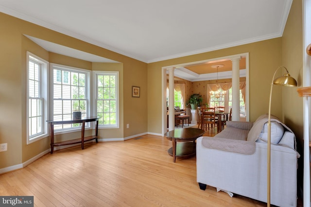 11294 Country Club Rd, New Market, MD 21774 - living area with decorative columns, baseboards, light wood-style flooring, ornamental molding, and a chandelier
