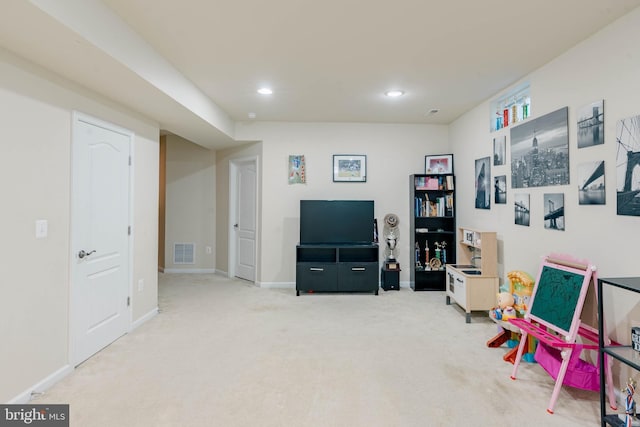 rec room featuring light colored carpet, baseboards, visible vents, and recessed lighting