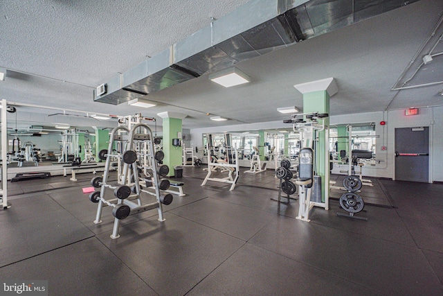 4600 S Four Mile Run Dr S Unit 911, Arlington, VA 22204 - exercise room with a textured ceiling