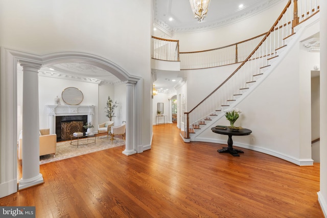 2619 Sledding Hill Rd, Oakton, VA 22124 - foyer with stairway, a high end fireplace, ornamental molding, and a high ceiling