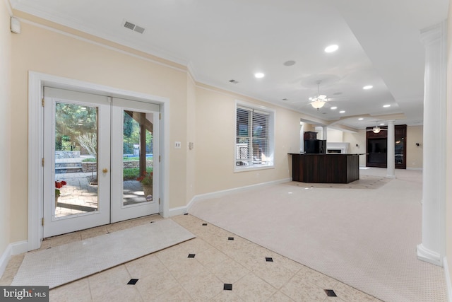 2619 Sledding Hill Rd, Oakton, VA 22124 - foyer entrance with visible vents, ornamental molding, light carpet, ceiling fan, and french doors