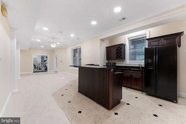 2619 Sledding Hill Rd, Oakton, VA 22124 - kitchen featuring dark countertops, ornamental molding, a sink, and black fridge with ice dispenser