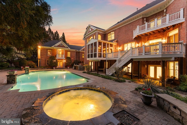 2619 Sledding Hill Rd, Oakton, VA 22124 - outdoor pool with a patio, a deck, an in ground hot tub, and stairs