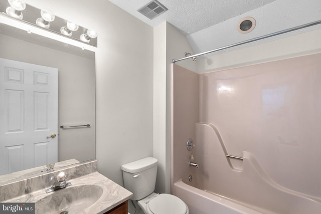 full bathroom featuring vanity, visible vents, bathing tub / shower combination, toilet, and vaulted ceiling