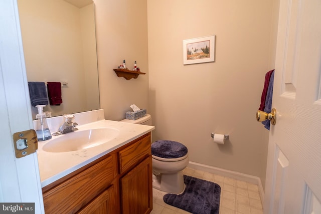 1069 E 2nd St, Red Hill, PA 18076 - half bathroom with toilet, baseboards, and vanity