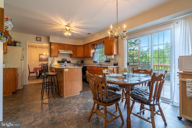 1069 E 2nd St, Red Hill, PA 18076 - dining area featuring ceiling fan with notable chandelier