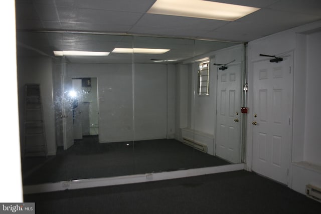 interior space featuring a baseboard heating unit