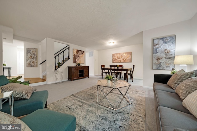 9120 Galbreth Ct, Springfield, VA 22153 - living room featuring stairs, light carpet, baseboards, and a textured ceiling