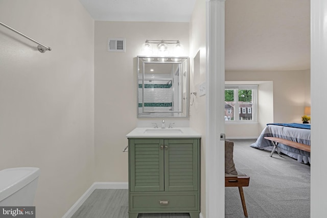 9120 Galbreth Ct, Springfield, VA 22153 - bathroom with baseboards, vanity, and toilet