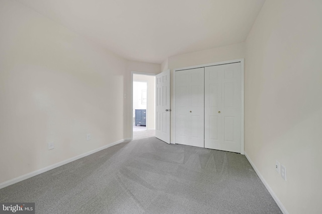 9120 Galbreth Ct, Springfield, VA 22153 - unfurnished bedroom featuring carpet flooring, baseboards, and a closet