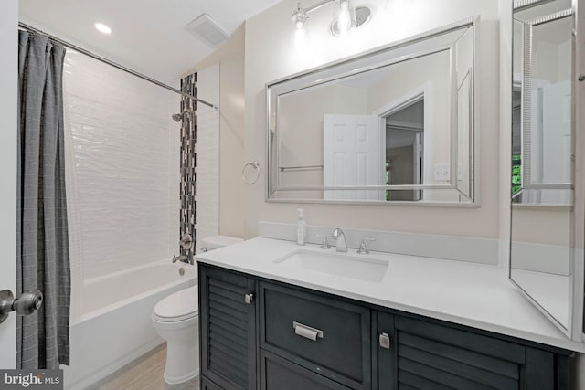 9120 Galbreth Ct, Springfield, VA 22153 - bathroom featuring toilet, vanity, shower / tub combo with curtain, and wood finished floors