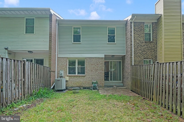 9120 Galbreth Ct, Springfield, VA 22153 - rear view of property featuring central AC unit and brick siding