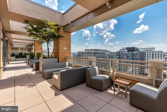 view of patio / terrace with a balcony